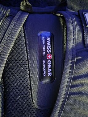 SwissGear Black and Silver 28L Backpack - Padded Mesh Back